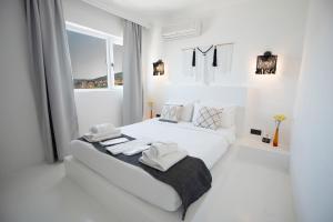 Postel nebo postele na pokoji v ubytování Çamlık 87 Hotel Ayvalık