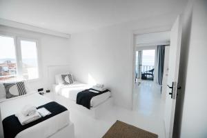 Postel nebo postele na pokoji v ubytování Çamlık 87 Hotel Ayvalık