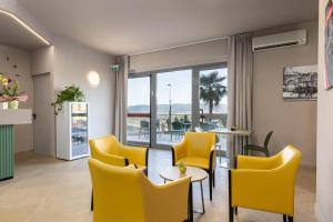 Posezení v ubytování Tuscasì Aparthotel