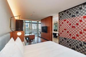 Cama ou camas em um quarto em Park Hyatt Auckland