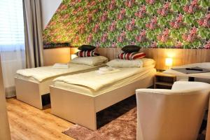Posteľ alebo postele v izbe v ubytovaní Apartments 461