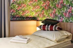 Posteľ alebo postele v izbe v ubytovaní Apartments 461