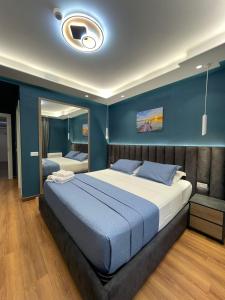 Postel nebo postele na pokoji v ubytování Peaky Hotel