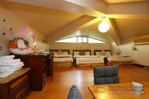 Giường trong phòng chung tại Yun Siang Ju Homestay