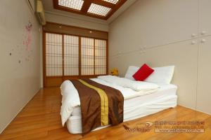 Giường trong phòng chung tại Yun Siang Ju Homestay