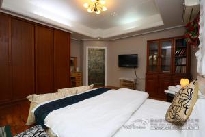 Giường trong phòng chung tại Yun Siang Ju Homestay