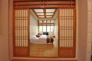 Giường trong phòng chung tại Yun Siang Ju Homestay