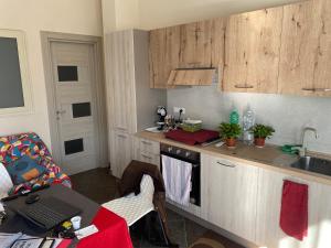 a kitchen with a sink and a counter top at B&B l'angoletto in Trebisacce