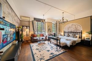 Postel nebo postele na pokoji v ubytování 柃居 B&B - Sinan Mansion Branch