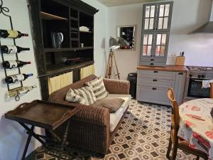a living room with a couch and a table at L'authentique de la Roche in La Roche-en-Ardenne +14 photos
