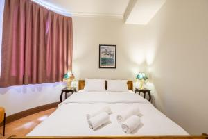 Postel nebo postele na pokoji v ubytování Mayer Taksim Apartments + 17 fotografií