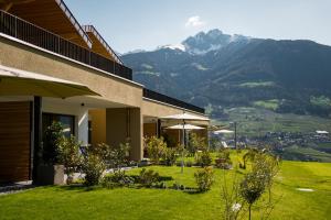 a house with a view of a mountain at Pataunerhof Tirol in Tirolo
