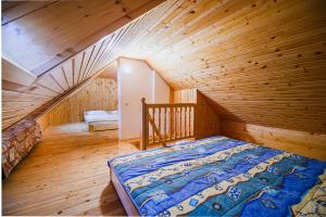 Postel nebo postele na pokoji v ubytování Vineyard Cottage Maleric with Pool Access