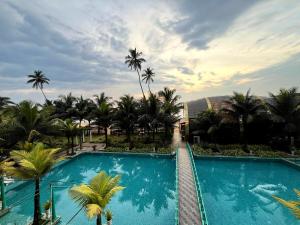Bazén v ubytování Aryana Queen Beach Resort nebo v jeho okolí