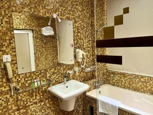 Koupelna v ubytování Aryana Queen Beach Resort + 37 fotografií