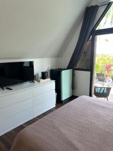 Μια τηλεόραση ή/και κέντρο ψυχαγωγίας στο Rawai Beach studio