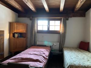 Ein Bett oder Betten in einem Zimmer der Unterkunft Chalet mit Blick auf den Gotschna