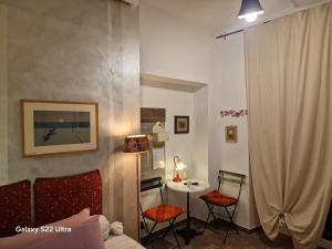 Posezení v ubytování B&B La Riva del Po Camera indipendente