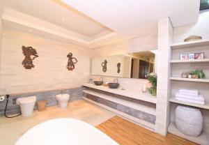 a bathroom with a toilet and a sink at Large Private Villa, central Seminyak, Bali in Seminyak +32 photos