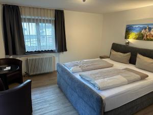 Postel nebo postele na pokoji v ubytování Hotel Fürstenhof