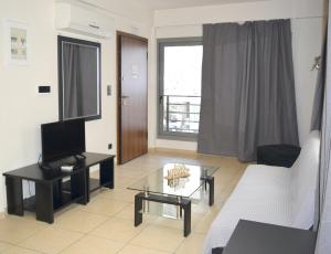 Athenian Central Apartments TV 또는 엔터테인먼트 센터