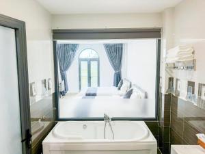 Postel nebo postele na pokoji v ubytování 6668 Hotel - Chi nhánh 2 + 9 fotografií