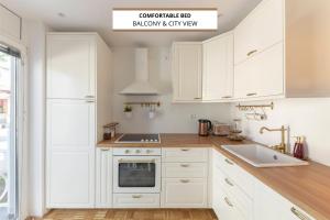 Kuchyň nebo kuchyňský kout v ubytování DSE Apartment