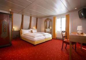 Afbeelding uit fotogalerij van Romantik Hotel de L'Ours in Sugiez