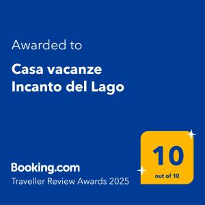a yellow sign that says awarded to casa vacanza incanta del lagosa at Casa vacanze "INCANTO DEL LAGO" in Corna