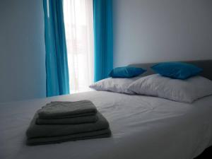 Łóżko lub łóżka w pokoju w obiekcie Wisełka Apartamenty Sea & Lake