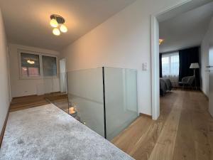 Posteľ alebo postele v izbe v ubytovaní Leopoldsdorf Premium Apartments