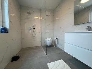 Kúpeľňa v ubytovaní Leopoldsdorf Premium Apartments