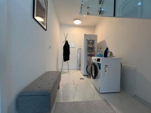 Kuchyňa alebo kuchynka v ubytovaní Leopoldsdorf Premium Apartments