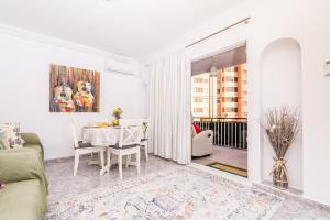 A seating area at Apartamento Mágico Javea Arenal