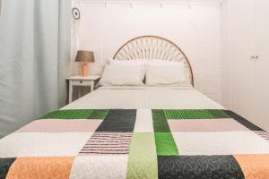 A bed or beds in a room at Apartamento Mágico Javea Arenal