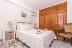 A bed or beds in a room at Apartamento Mágico Javea Arenal