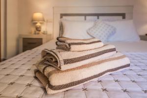 A bed or beds in a room at Apartamento Mágico Javea Arenal
