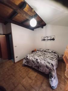 Postel nebo postele na pokoji v ubytování Locanda monte cervino