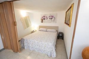 Posteľ alebo postele v izbe v ubytovaní Casa Caronia
