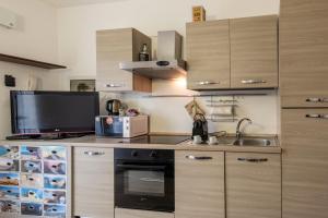 Kuchyň nebo kuchyňský kout v ubytování BnButler - Archimede 53 - Bright Studio