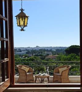A balcony or terrace at Trullo Pentimelle e Casa Pentimelle