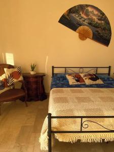 Postel nebo postele na pokoji v ubytování Piccolo Paradiso Appartamento vicino a stazione e spiaggia