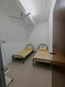 Katil atau katil-katil dalam bilik di Homestay Banting #7, TUTUP SEMENTARA