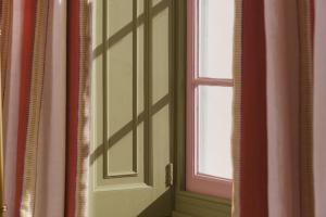 a door in a room with a window at Drakes Hotel in Brighton & Hove