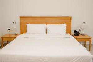 Assia Hotel客房内的一张或多张床位