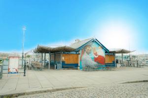 a building with a painting on the side of it at Executive Coach House on the Hoe 2 free parking spaces in Plymouth
