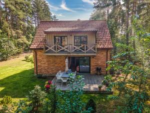 Vonkajšia záhrada v ubytovaní UTASIÓWKA Mazury