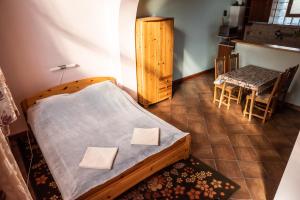Postel nebo postele na pokoji v ubytování Gesztenye Apartman