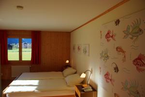 Letto o letti in una camera di Hotel Garni Hostatt