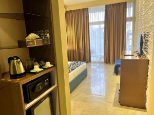 Kuchyň nebo kuchyňský kout v ubytování Aryana Queen Beach Resort